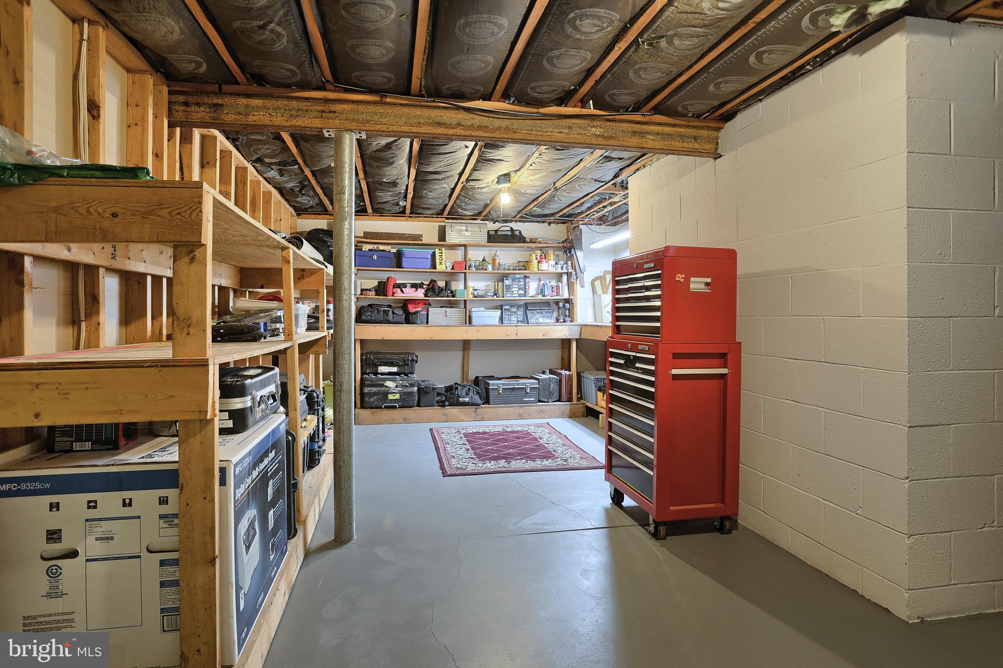 2 Pennwood Road Lebanon, PA 17042 - Photo 35 of 44 Workshop & shelving in basement man cave