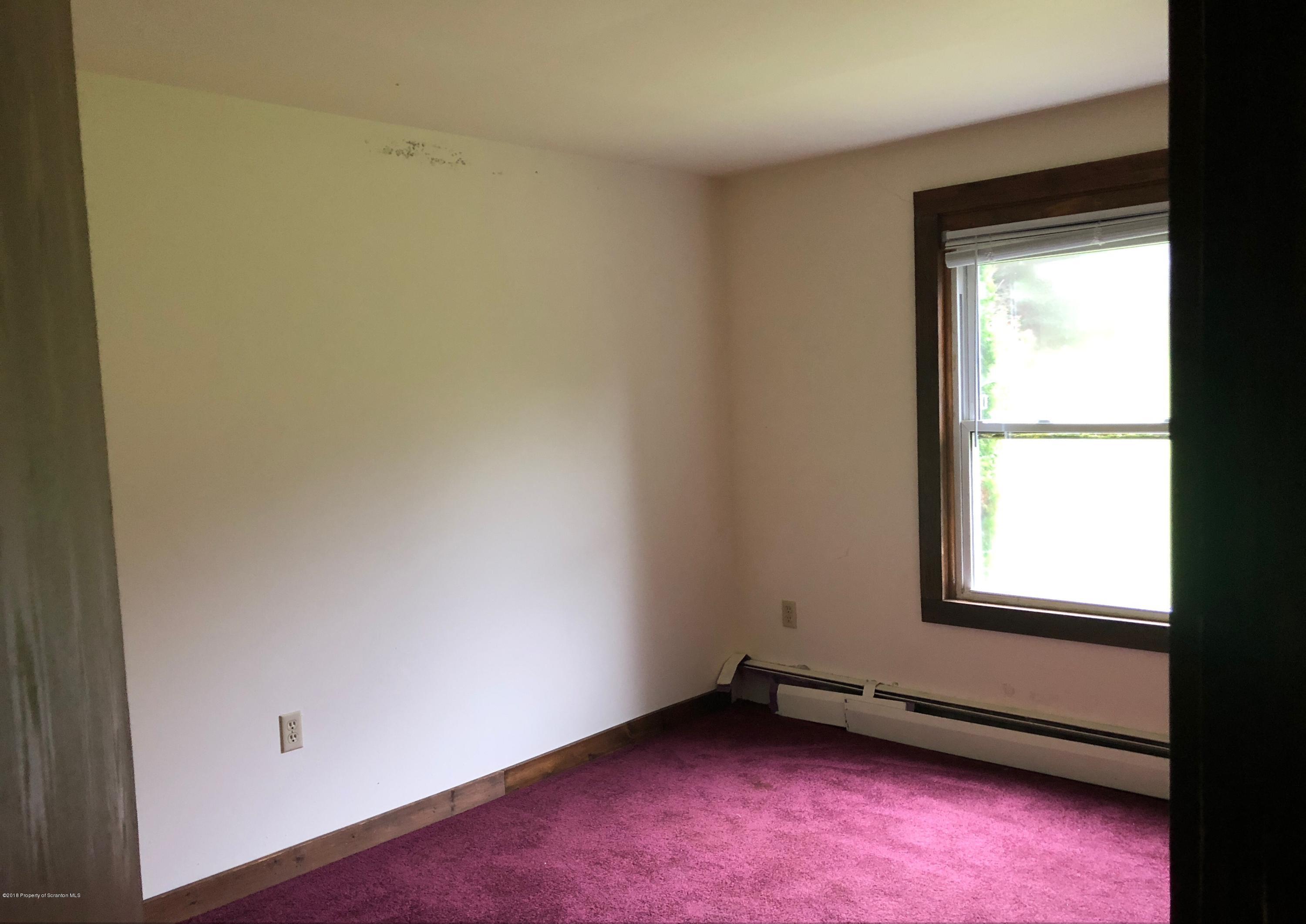 285 Log Rd Lake Lake Ariel, PA 18436 - Photo 11 of 12 an empty room with a window