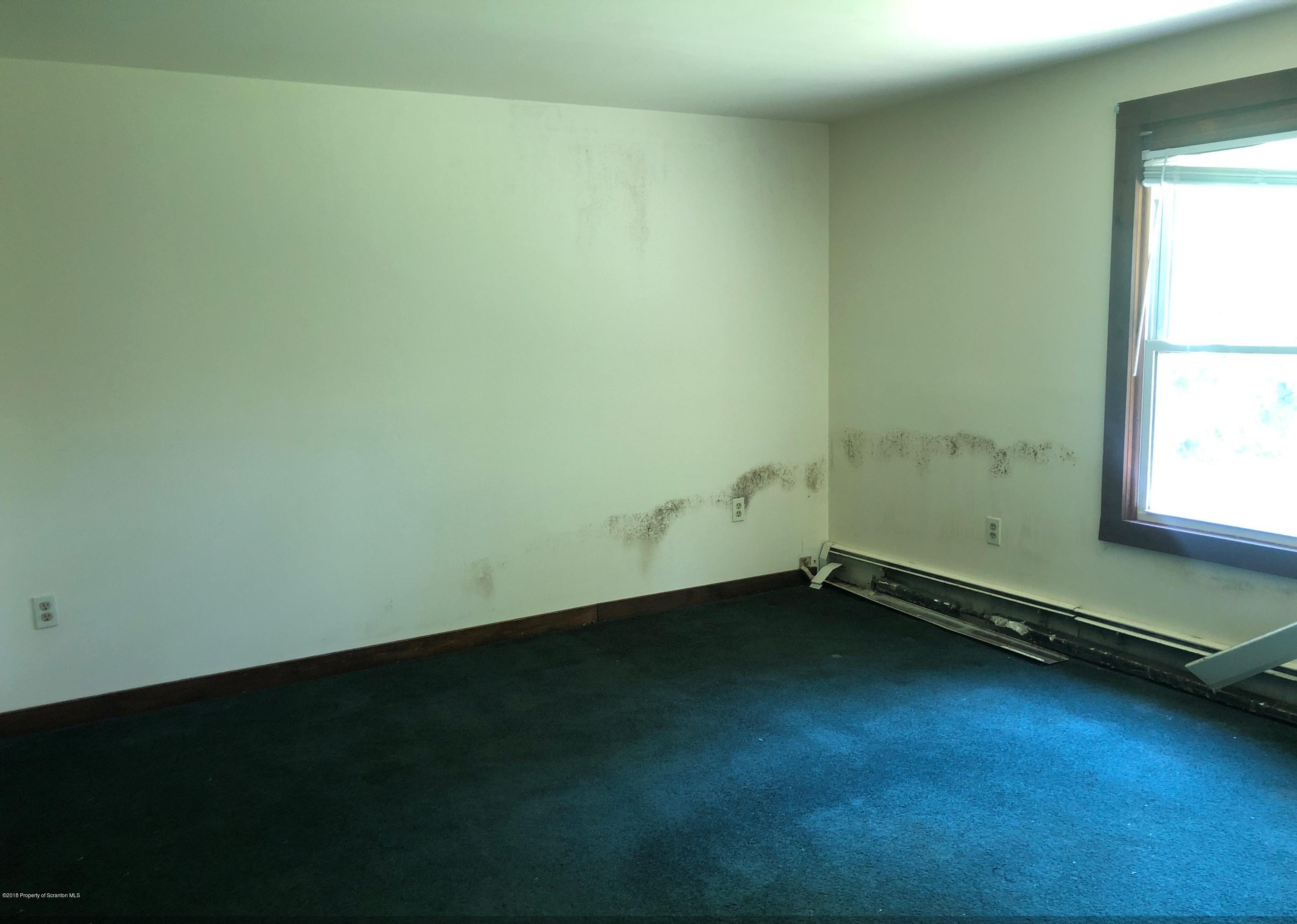 285 Log Rd Lake Lake Ariel, PA 18436 - Photo 6 of 12 an empty room with a window