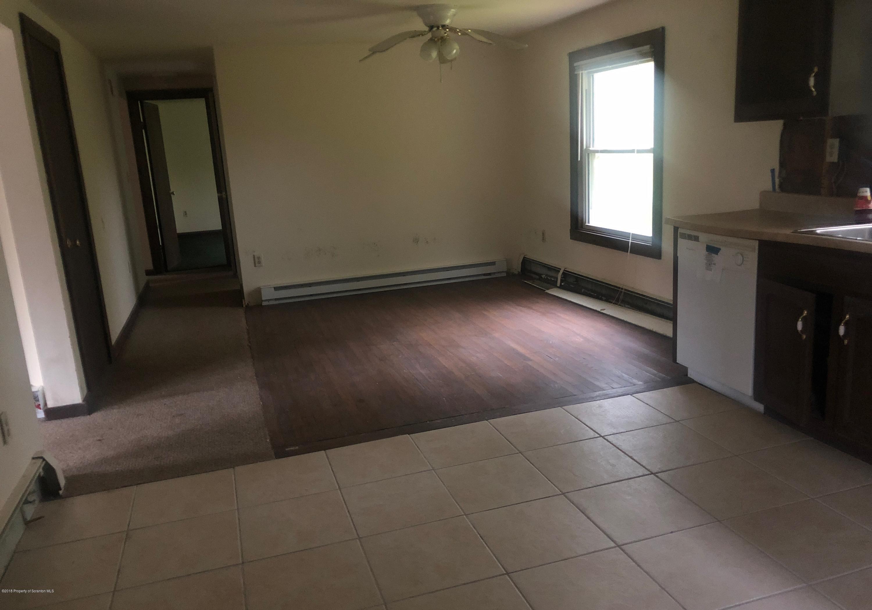 285 Log Rd Lake Lake Ariel, PA 18436 - Photo 9 of 12 an empty room with windows