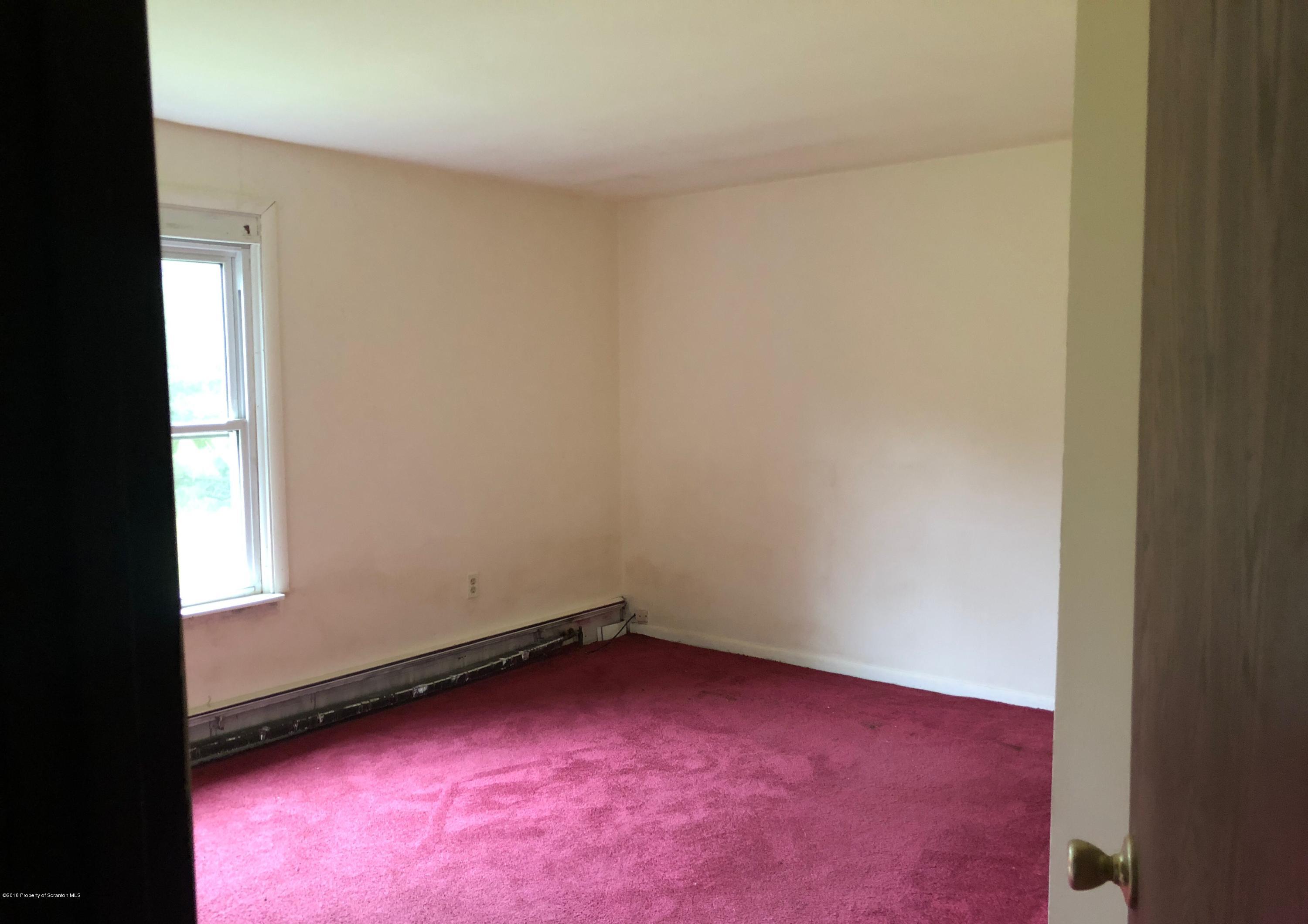 285 Log Rd Lake Lake Ariel, PA 18436 - Photo 10 of 12 an empty room with a window