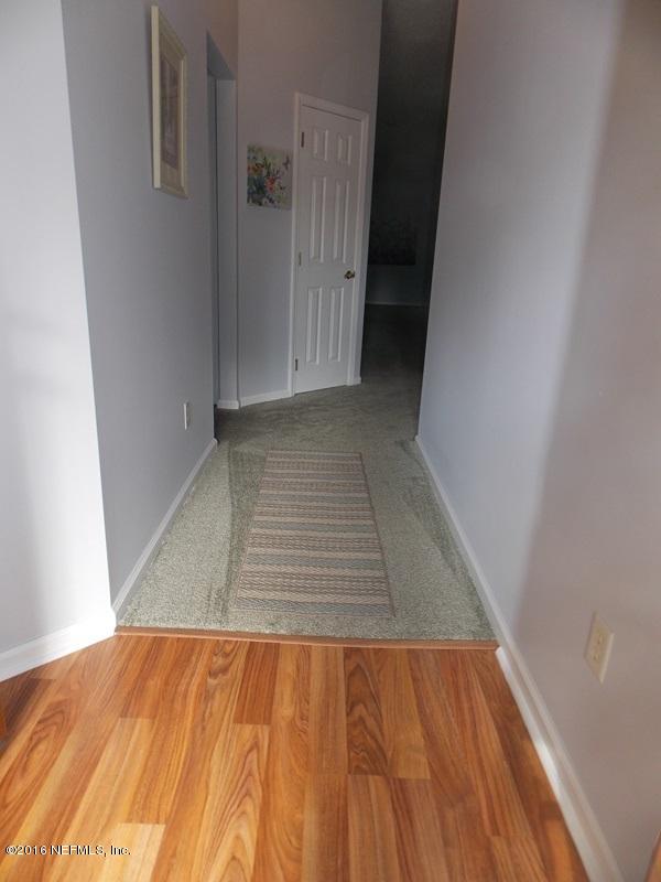 5491 Spring Brook Road Jacksonville, FL 32277 - Photo 19 of 29 view of wooden floor