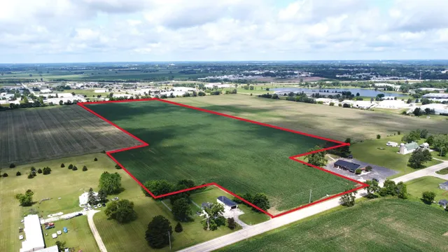 an aerial view of a golf course with outdoor space