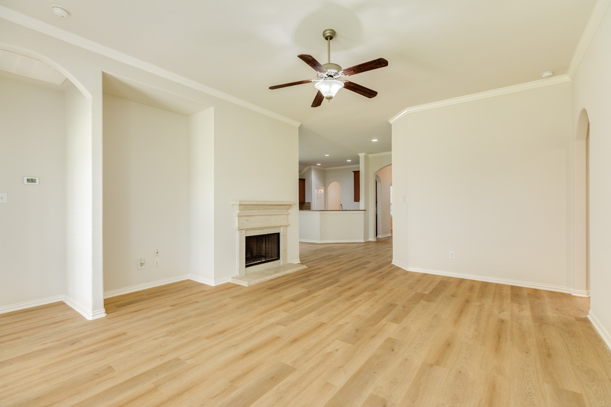 13417 Star Creek Lane Rosharon, TX 77583 - Photo 17 of 41 a view of empty room with wooden floor and ceiling fan