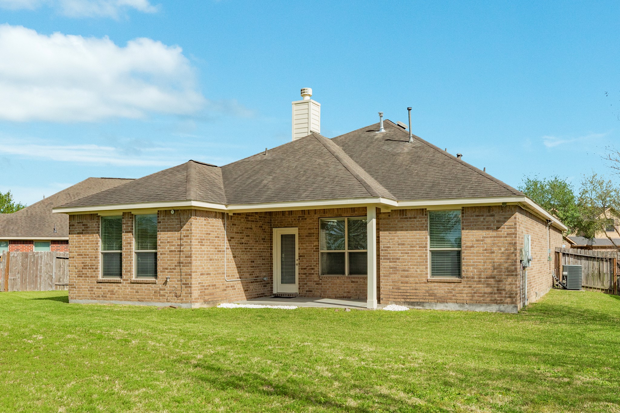 13417 Star Creek Lane Rosharon, TX 77583 - Photo 29 of 41 a front view of a house with a garden
