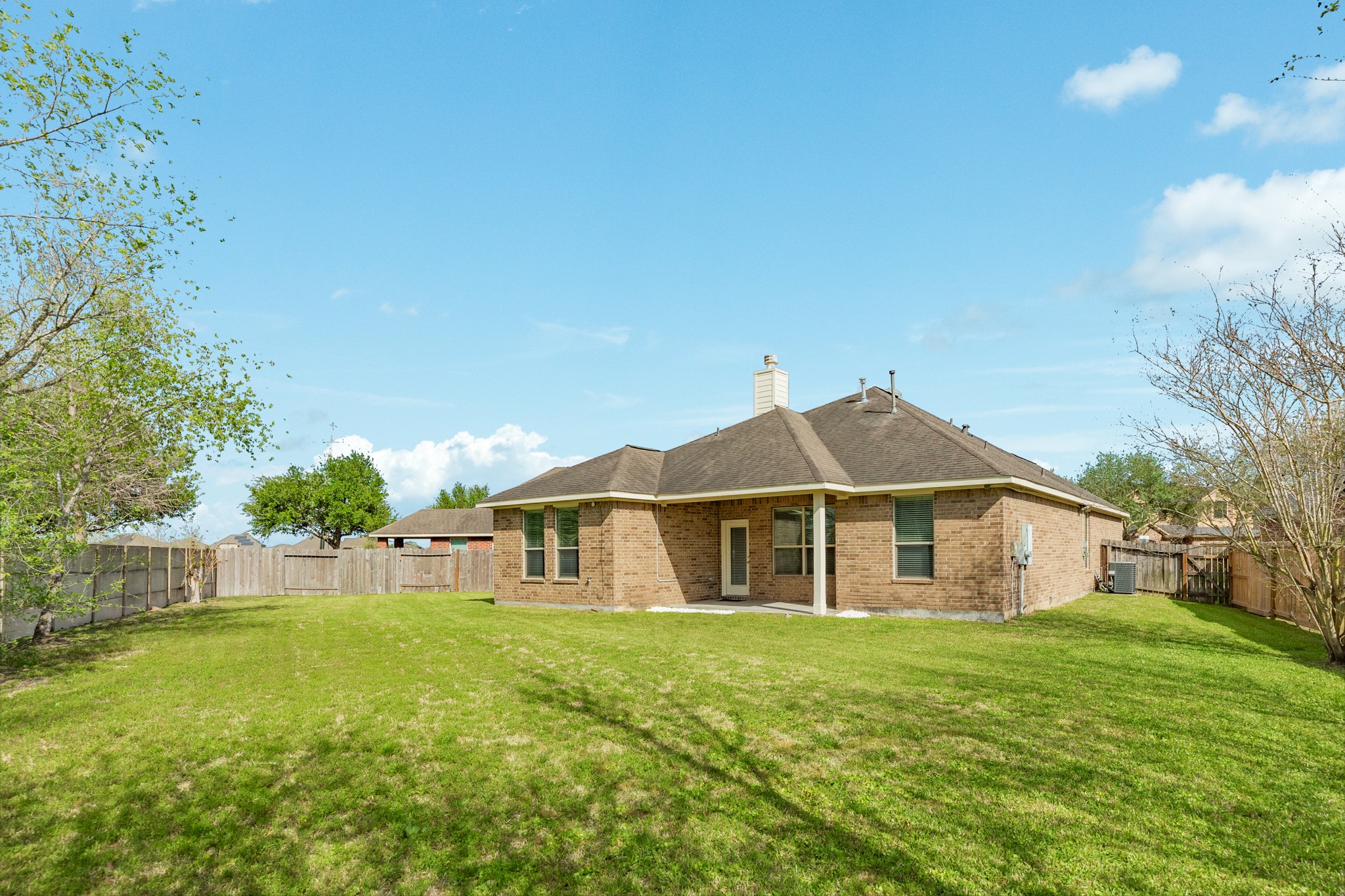 13417 Star Creek Lane Rosharon, TX 77583 - Photo 30 of 41 a view of a house with a yard