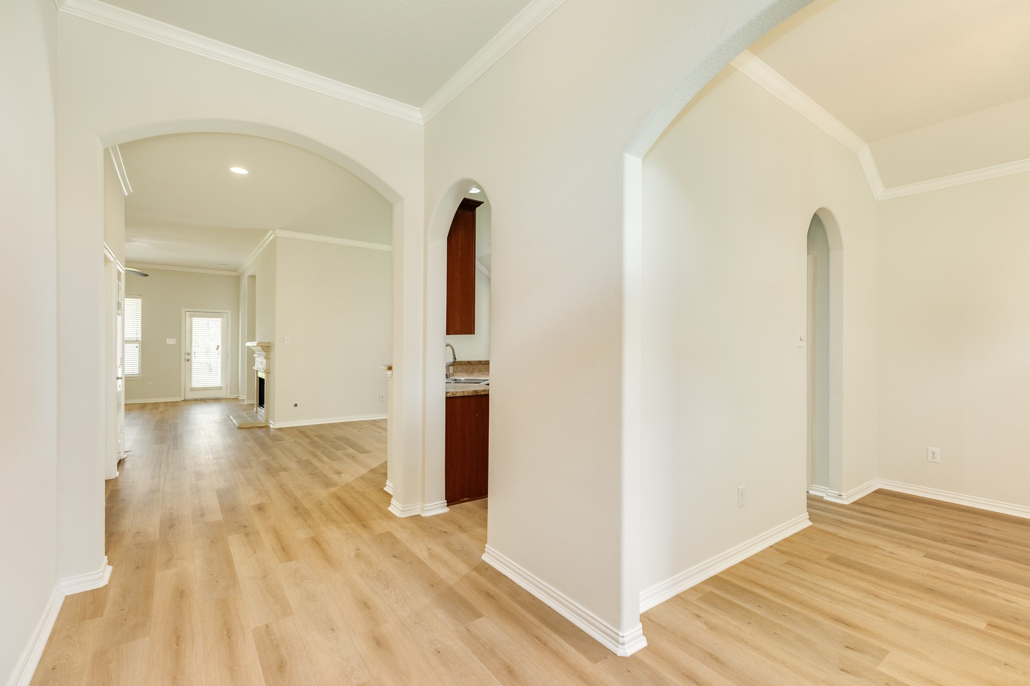 13417 Star Creek Lane Rosharon, TX 77583 - Photo 4 of 41 a view of empty room with wooden floor and fan
