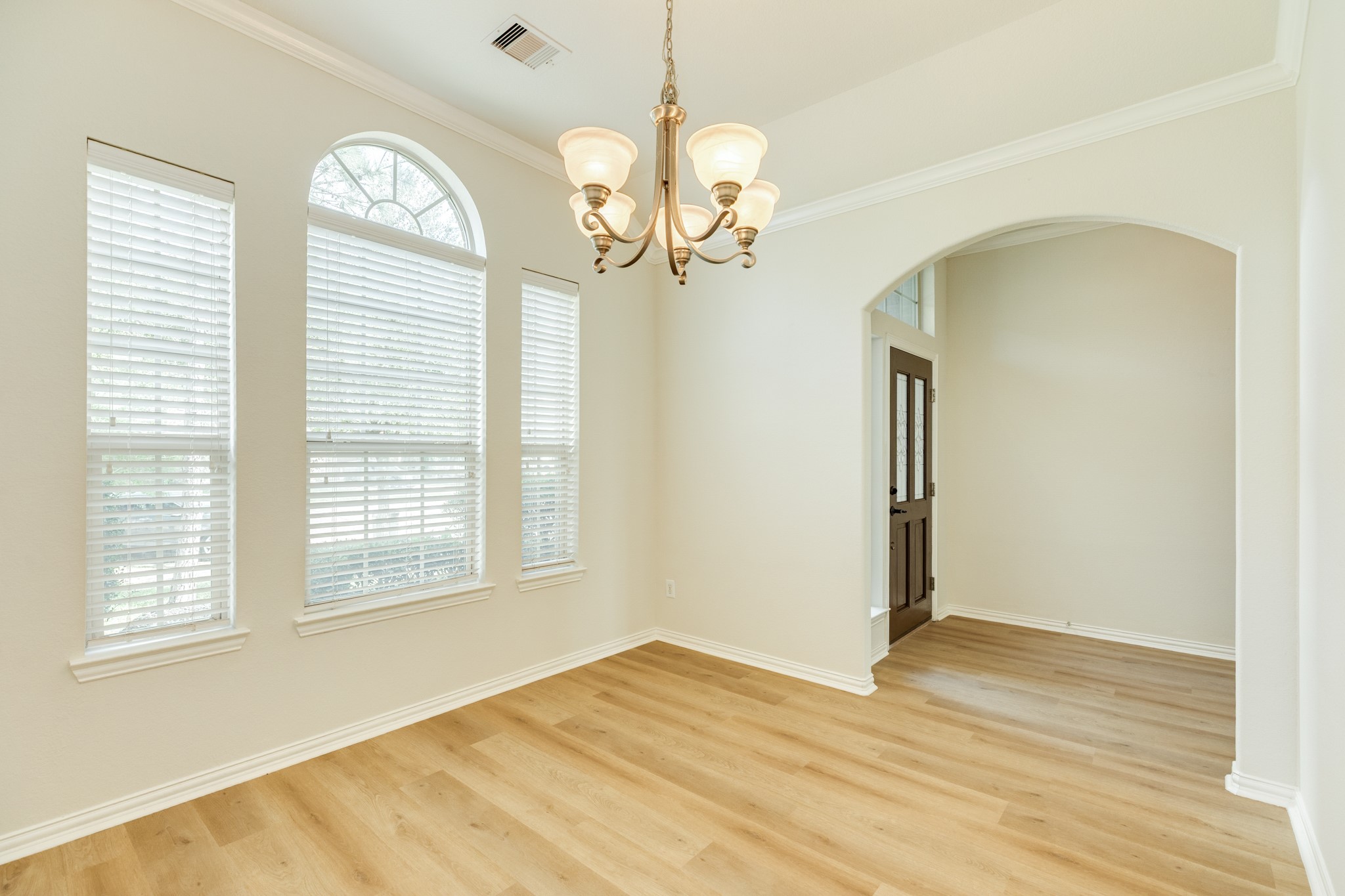 13417 Star Creek Lane Rosharon, TX 77583 - Photo 6 of 41 a view of empty room with wooden floor and fan