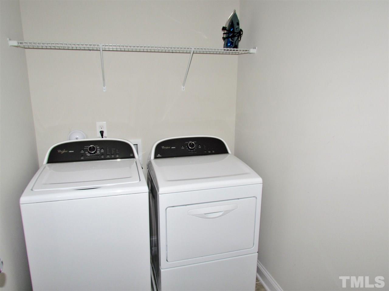 5713 Spring Glen Lane Raleigh, NC 27616 - Photo 22 of 25 a utility room with dryer and washer