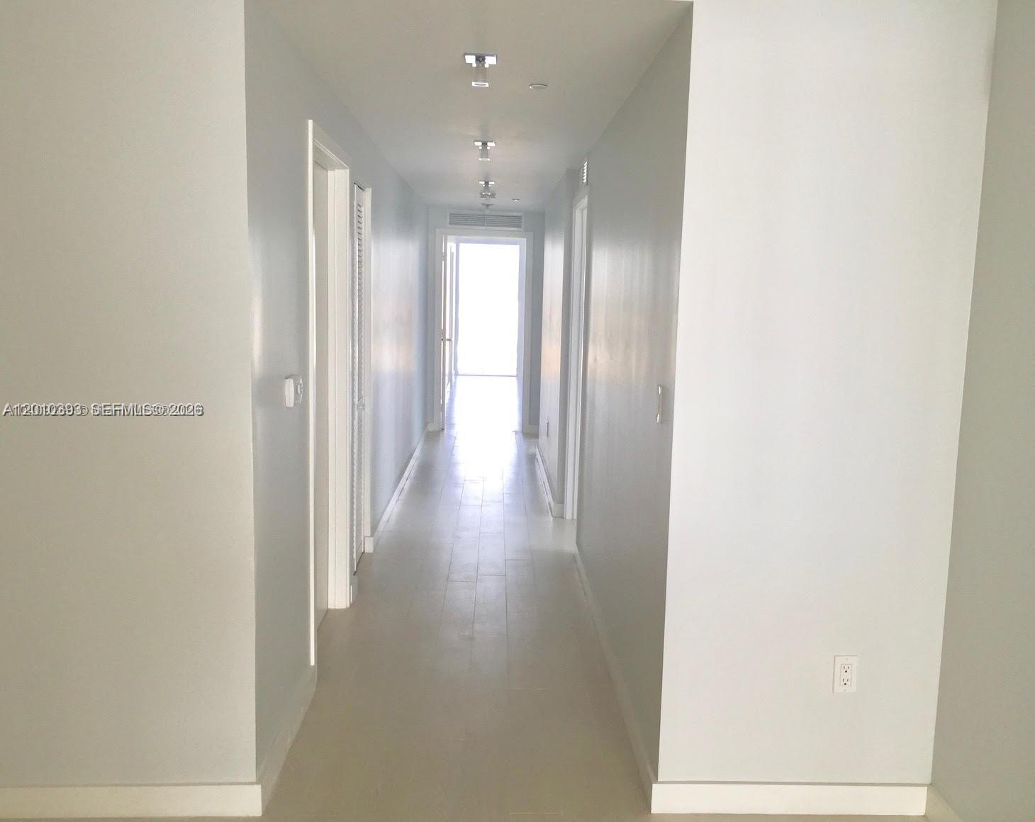 600 Northeast 27th Street, Unit 2001 Miami, FL 33137 - Photo 8 of 20 a view of gallery with wooden floor