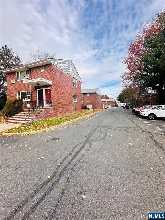 241 West Passaic Street, Unit 12B Rochelle Park, NJ 07662 - Photo 5 of 6 a view of a house with a patio