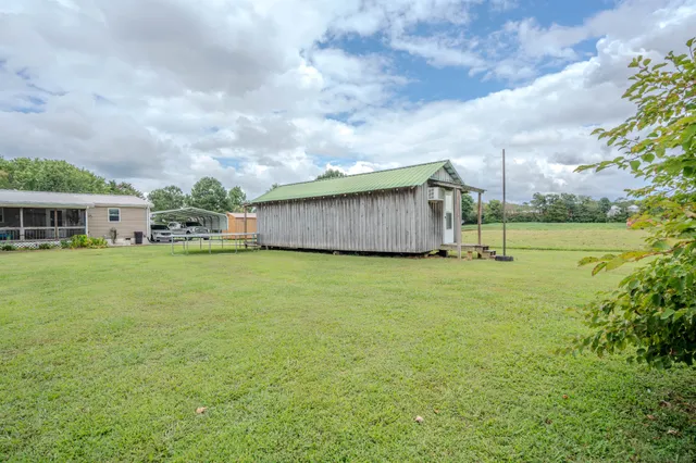 a house with garden in front of it