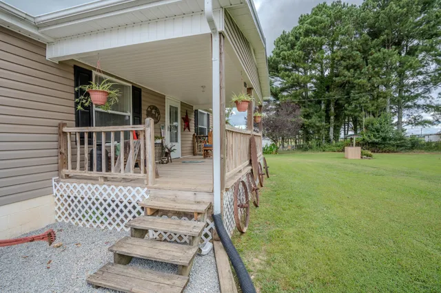 a lobby with furniture and potted plants