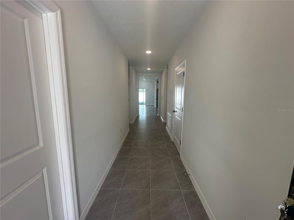 8795 Southwest 135th Place Ocala, FL 34473 - Photo 6 of 22 a view of a hallway