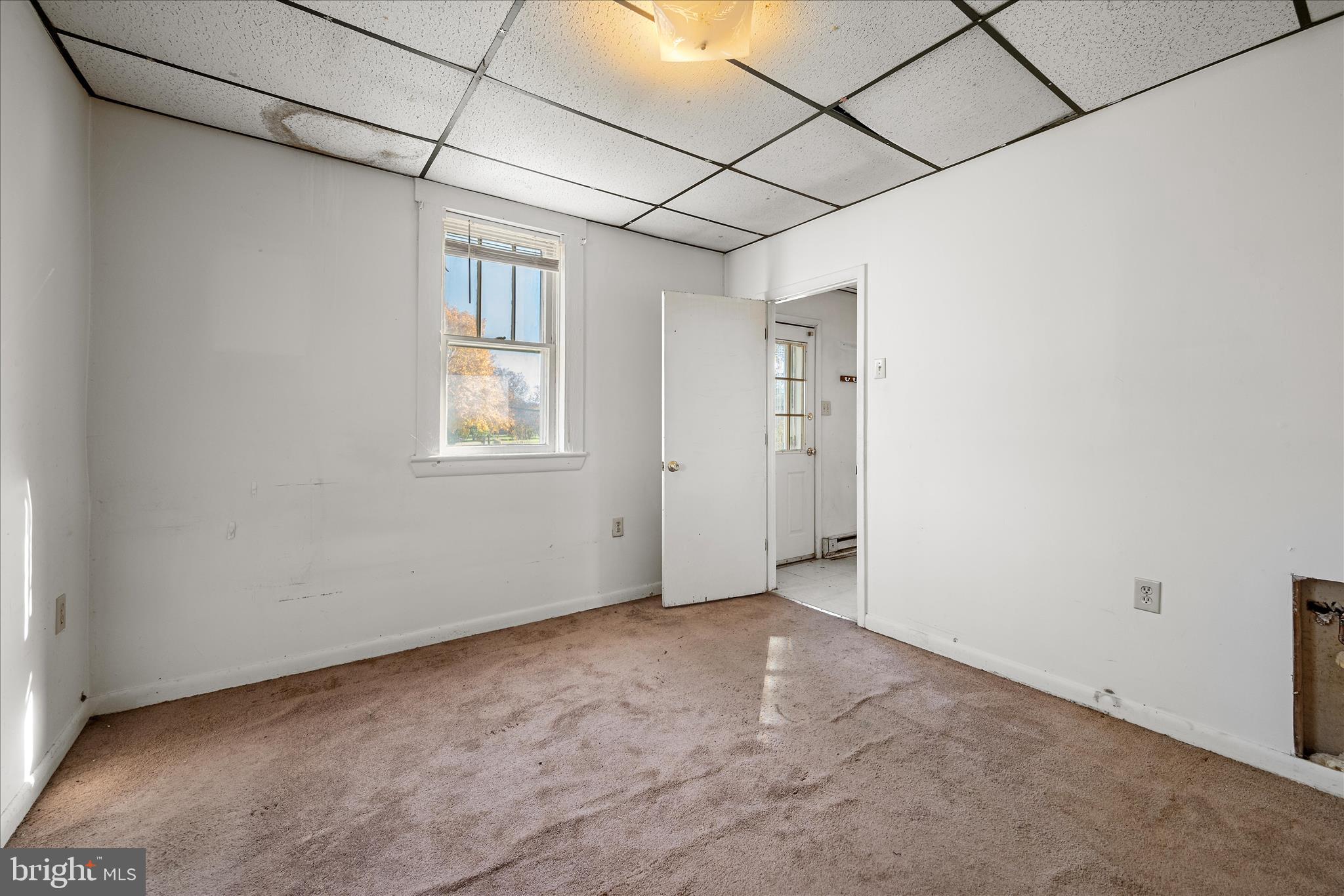 751-761 Old Charles Town Road Stephenson, VA 22656 - Photo 19 of 58 a view of an empty room with a window