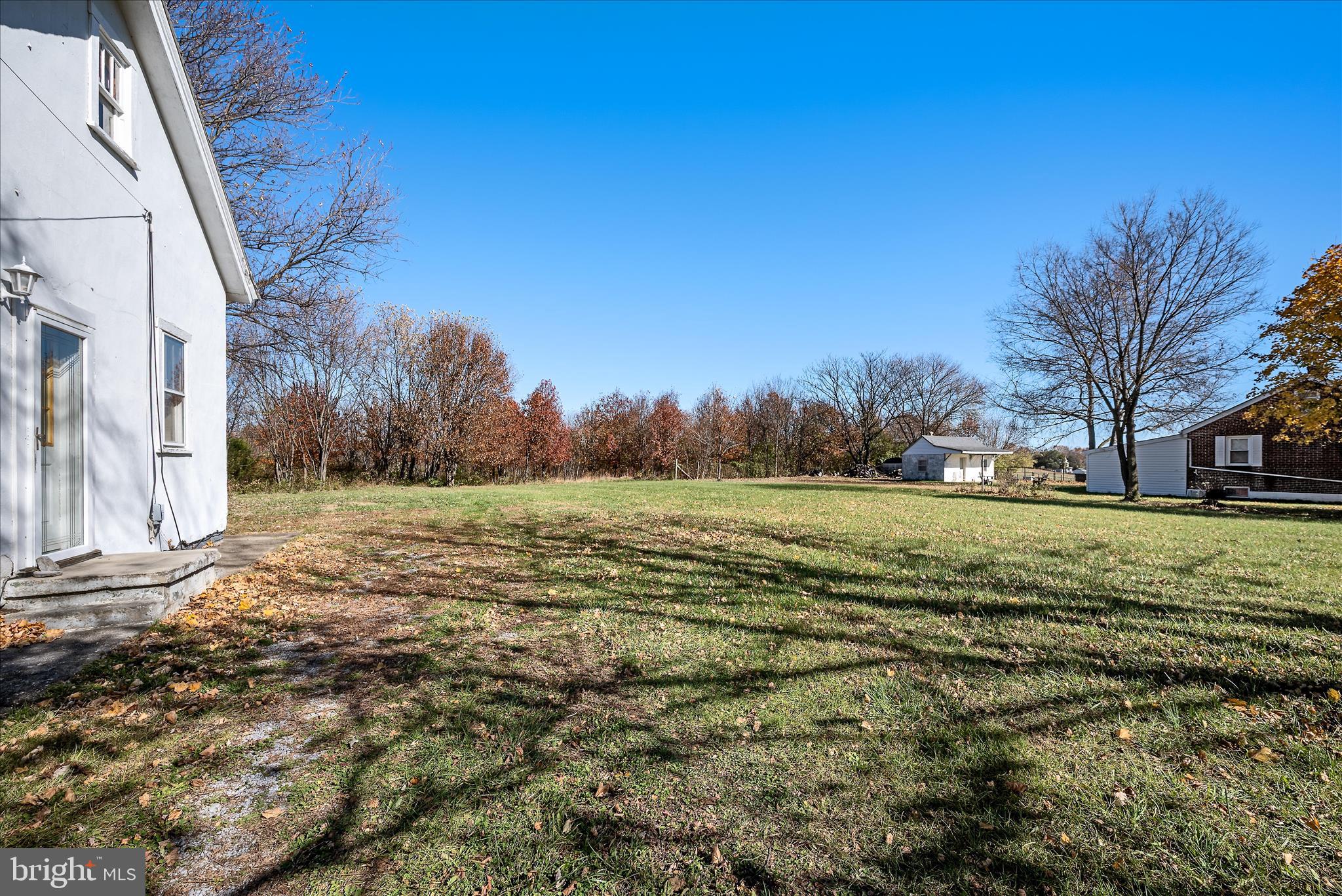 751-761 Old Charles Town Road Stephenson, VA 22656 - Photo 49 of 58 a view of a yard with an trees