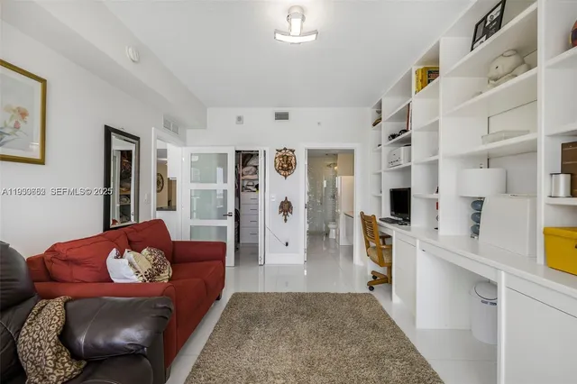 a living room with furniture and a couch