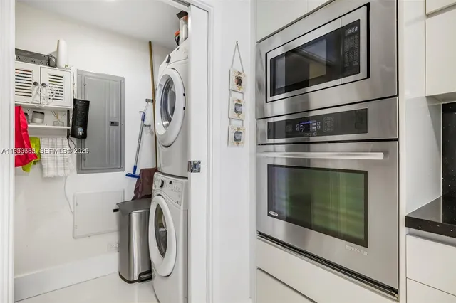 a kitchen with a stove and a microwave