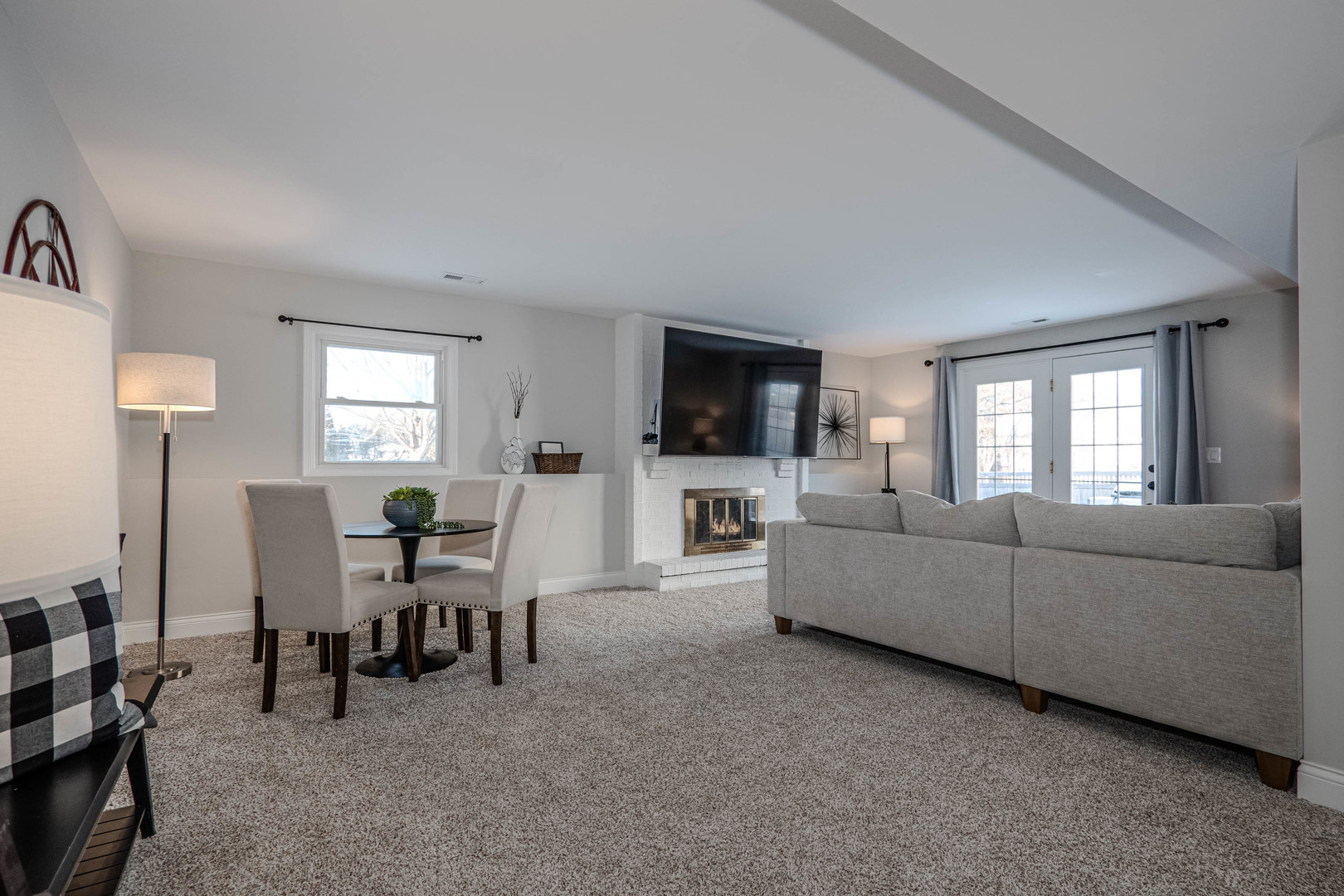 965 Independence Avenue St. Charles, IL 60174 - Photo 21 of 28 a living room with furniture and a flat screen tv