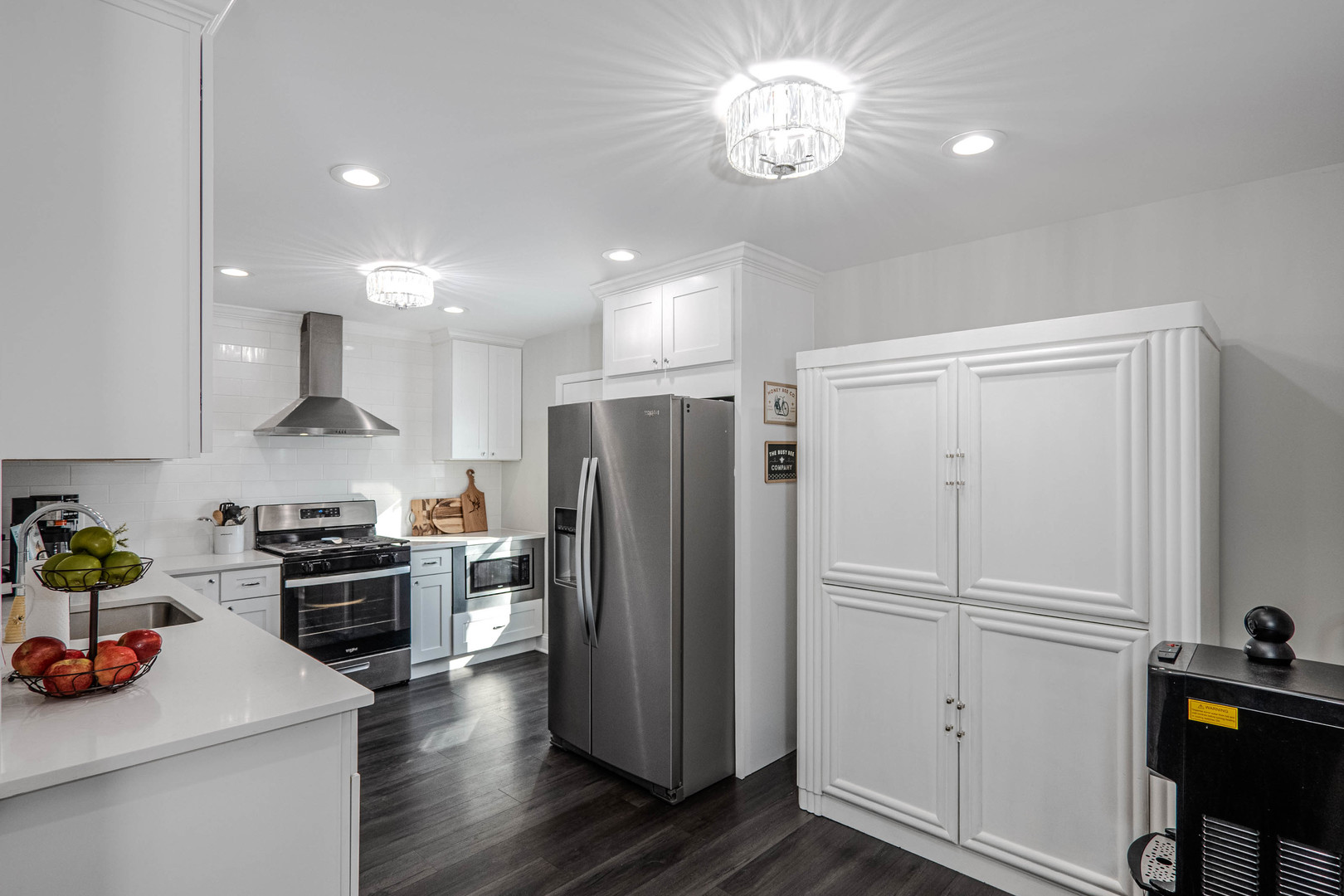965 Independence Avenue St. Charles, IL 60174 - Photo 6 of 28 a kitchen with a refrigerator and a stove top oven