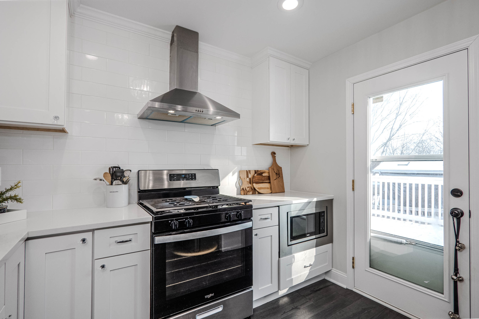 965 Independence Avenue St. Charles, IL 60174 - Photo 10 of 28 a kitchen with stainless steel appliances a stove and a microwave