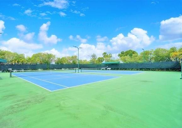 69 Simonton Circle, Unit 1 Weston, FL 33326 - Photo 17 of 23 a view of a green field