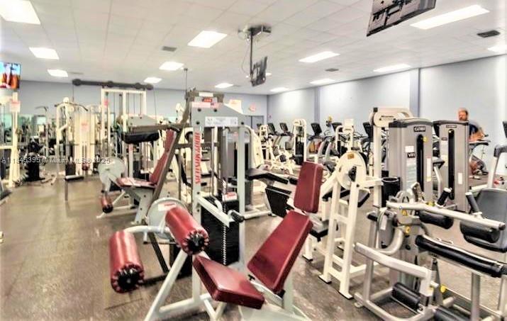 69 Simonton Circle, Unit 1 Weston, FL 33326 - Photo 21 of 23 a view of a room with gym equipment
