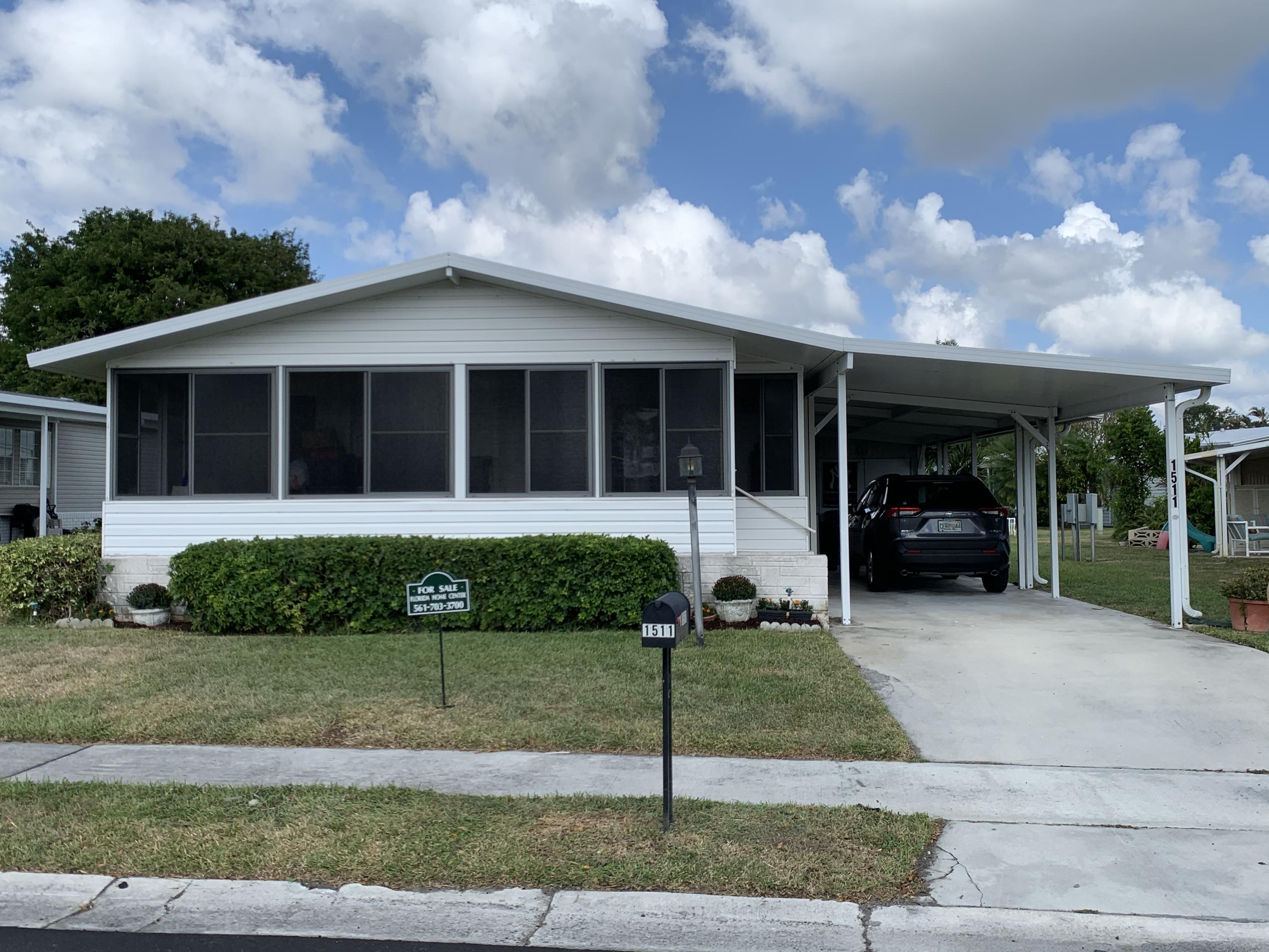 1511 Southwest 65th Avenue Boca Raton, FL 33428 - Photo 1 of 25 front of home