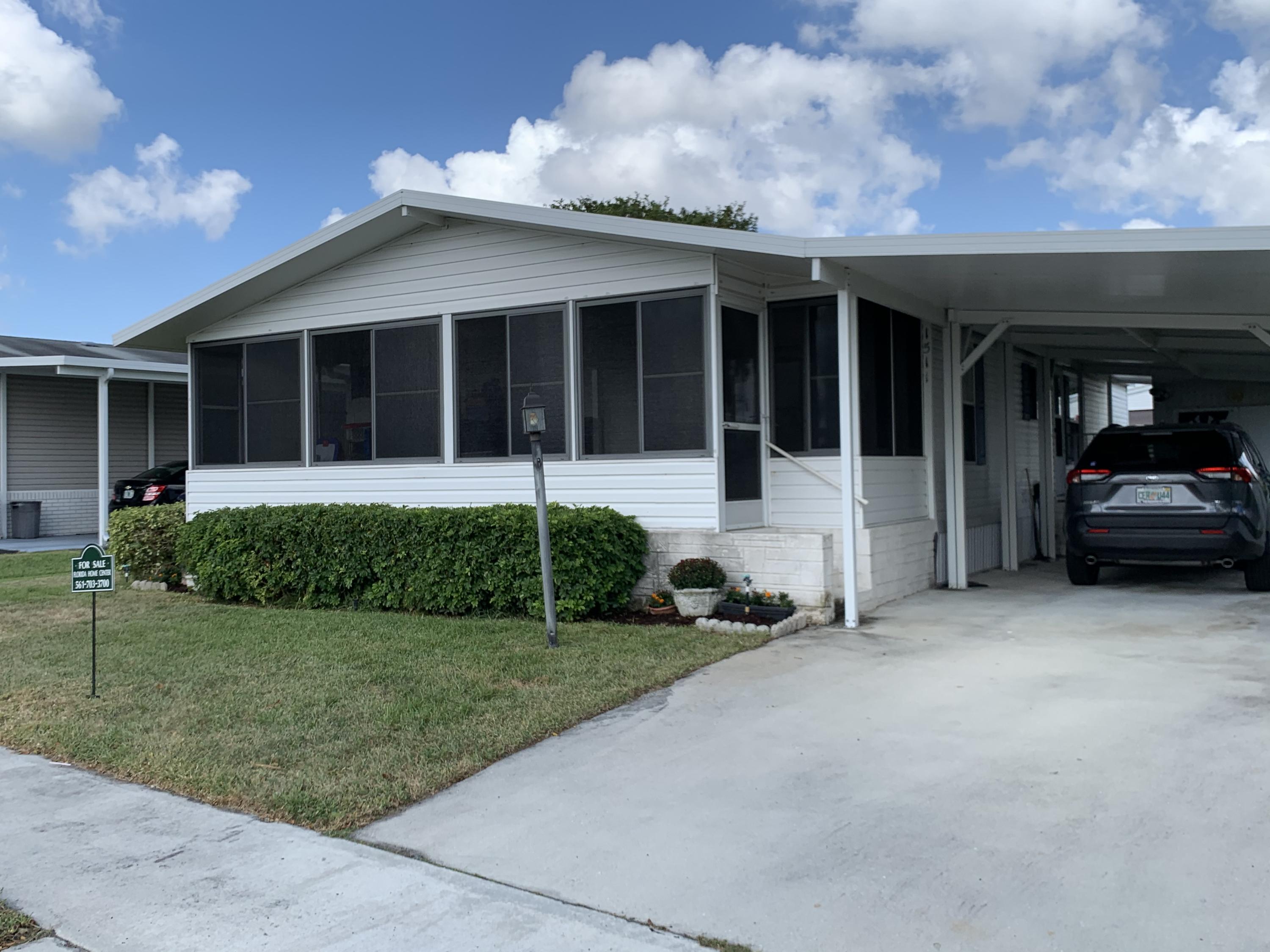 1511 Southwest 65th Avenue Boca Raton, FL 33428 - Photo 2 of 25 front of home