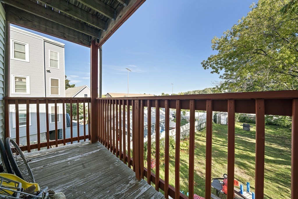 7 Tolman Street, Unit 2 Boston, MA 02122 - Photo 13 of 13 a view of wooden balcony