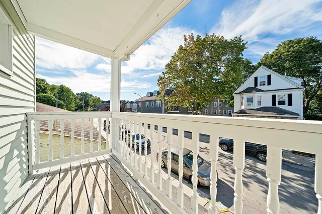 a view of a building from a balcony