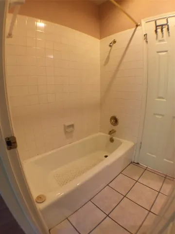 a kitchen with cabinets and appliances