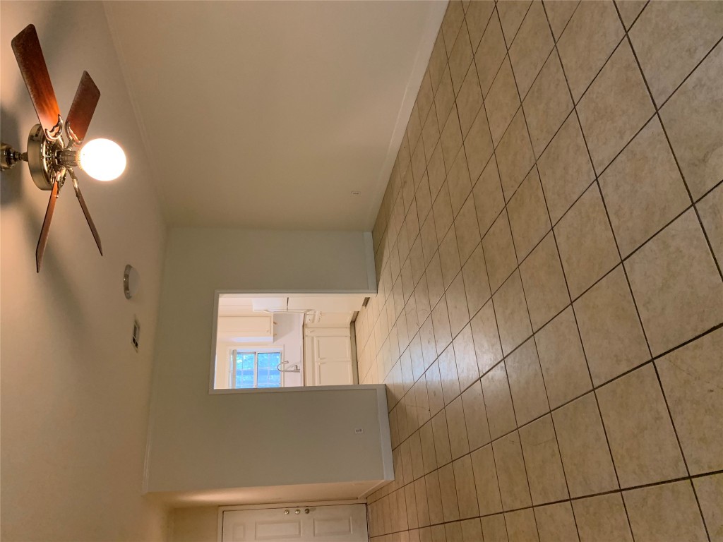 2100 San Gabriel Street, Unit 103 Austin, TX 78705 - Photo 19 of 20 a view of an empty room and a window