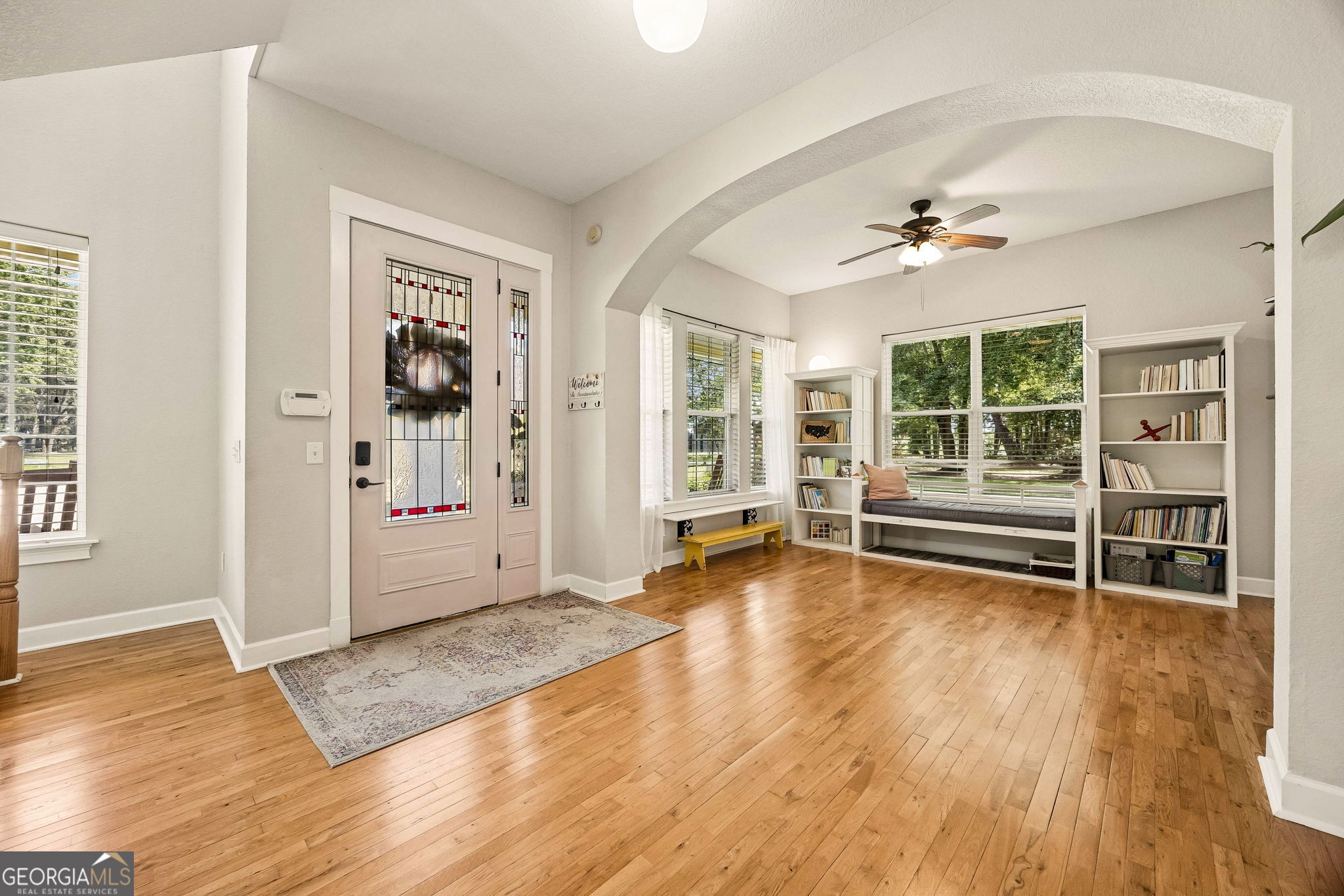 706 Hopewell Point Road White Oak, GA 31568 - Photo 5 of 84 Positioned just off the foyer, this flexible space is filled with natural light and offers the perfect setting for a reading room, home office, music room, or formal sitting area.