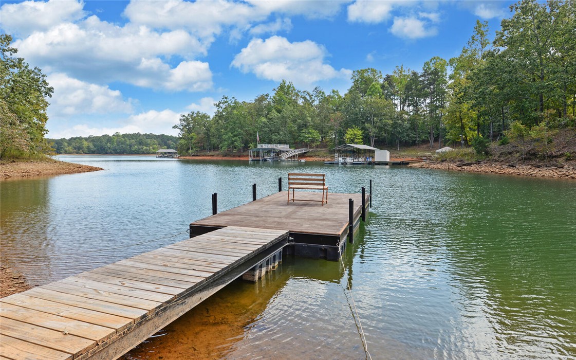 398 Hidden Point Road Hartwell, GA 30643 - Photo 35 of 46 This tranquil waterfront retreat offers a private dock for effortless lakeside living.