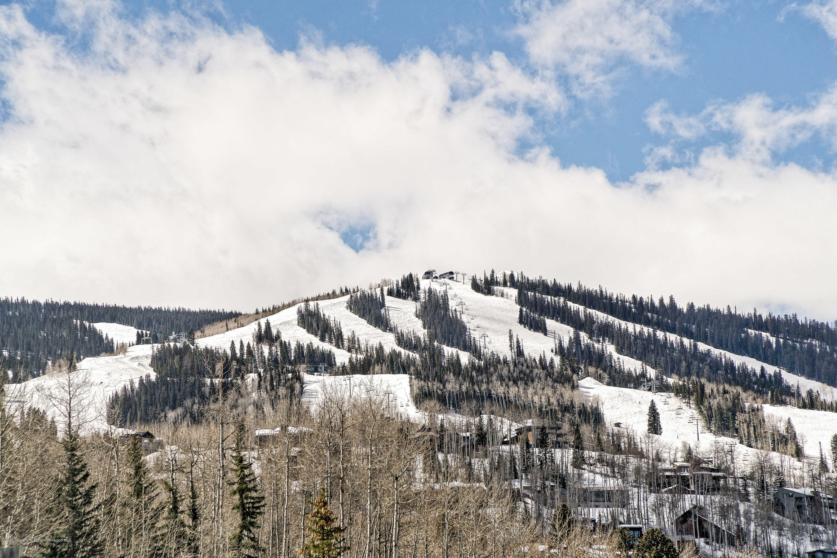 810 Ridge Road, Unit 6 Snowmass Village, CO 81615 - Photo 28 of 33 a roof with city view