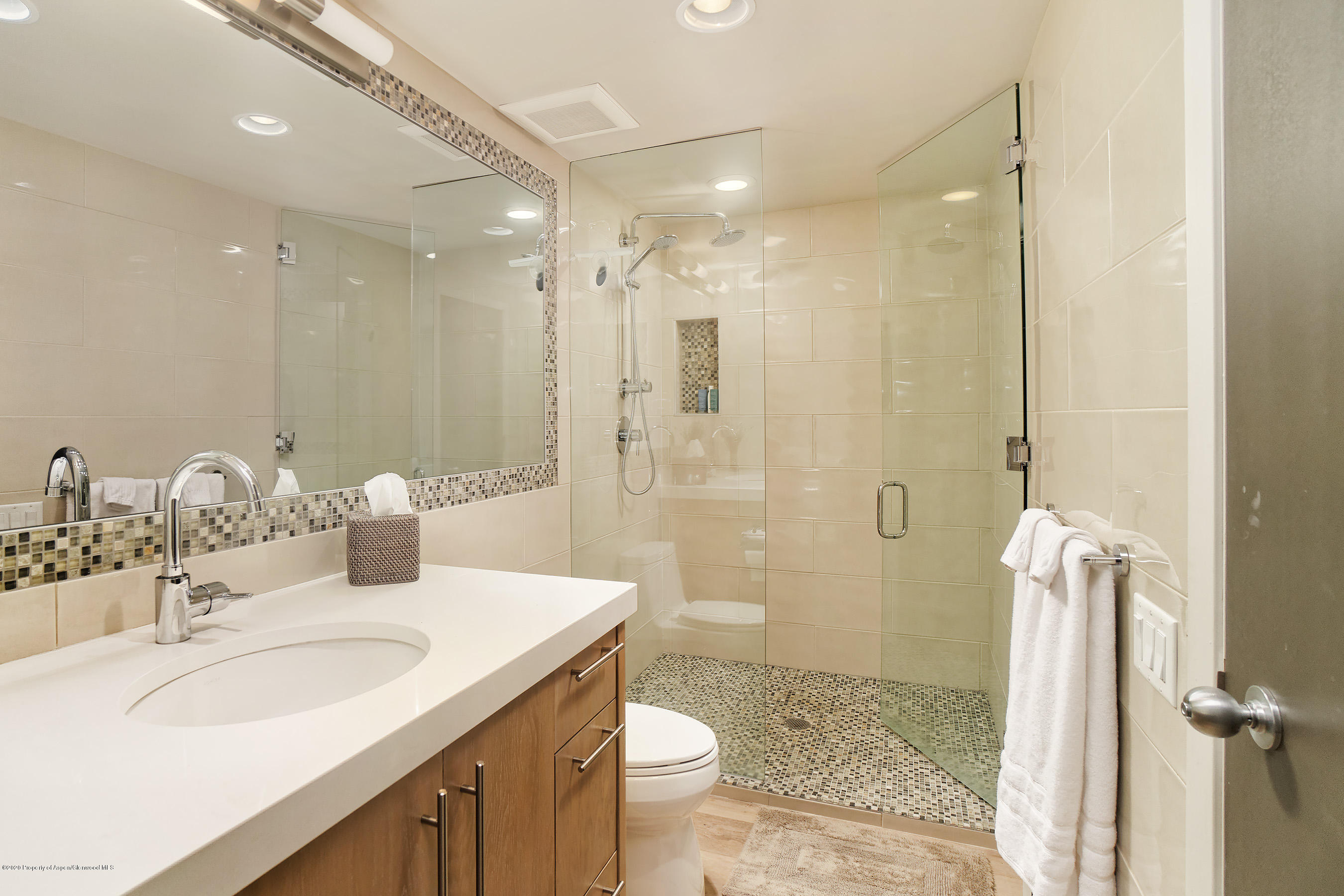 810 Ridge Road, Unit 6 Snowmass Village, CO 81615 - Photo 10 of 33 a bathroom with a sink a toilet and shower