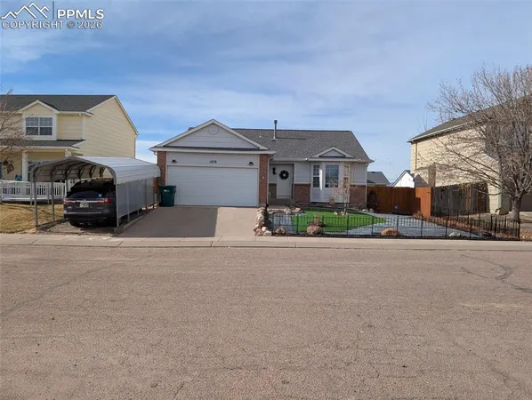 front view of a house with a street