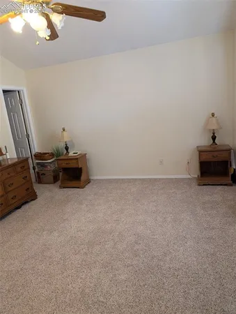 a room with furniture and a mirror