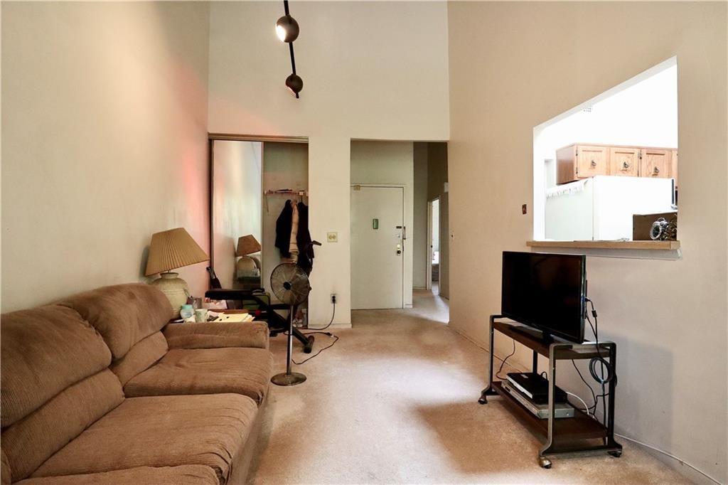 9967 Shore Road, Unit 7E Brooklyn, NY 11209 - Photo 12 of 19 a living room with furniture