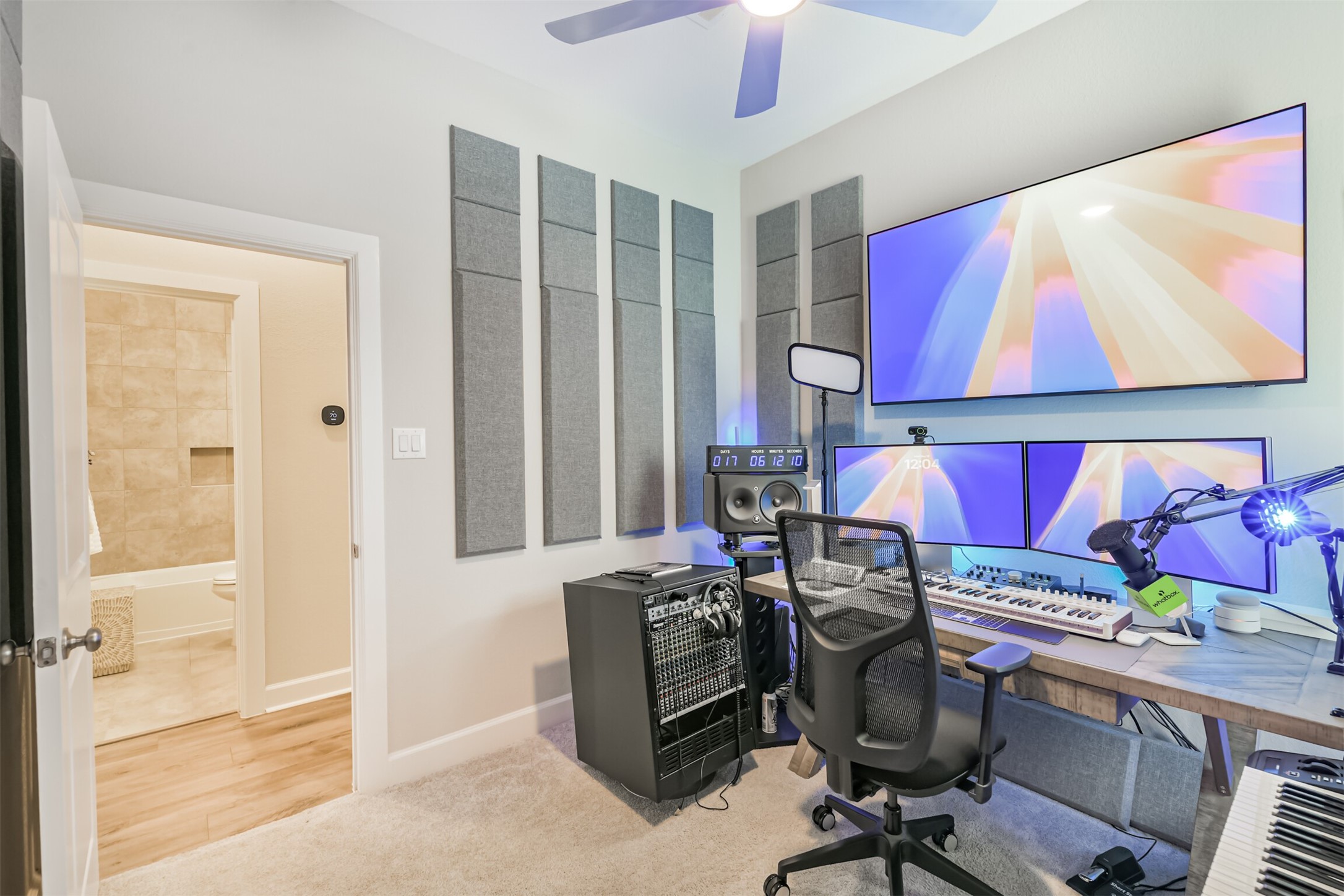 15611 Rising Wren Court Conroe, TX 77302 - Photo 33 of 38 a view of a workspace with furniture and a window