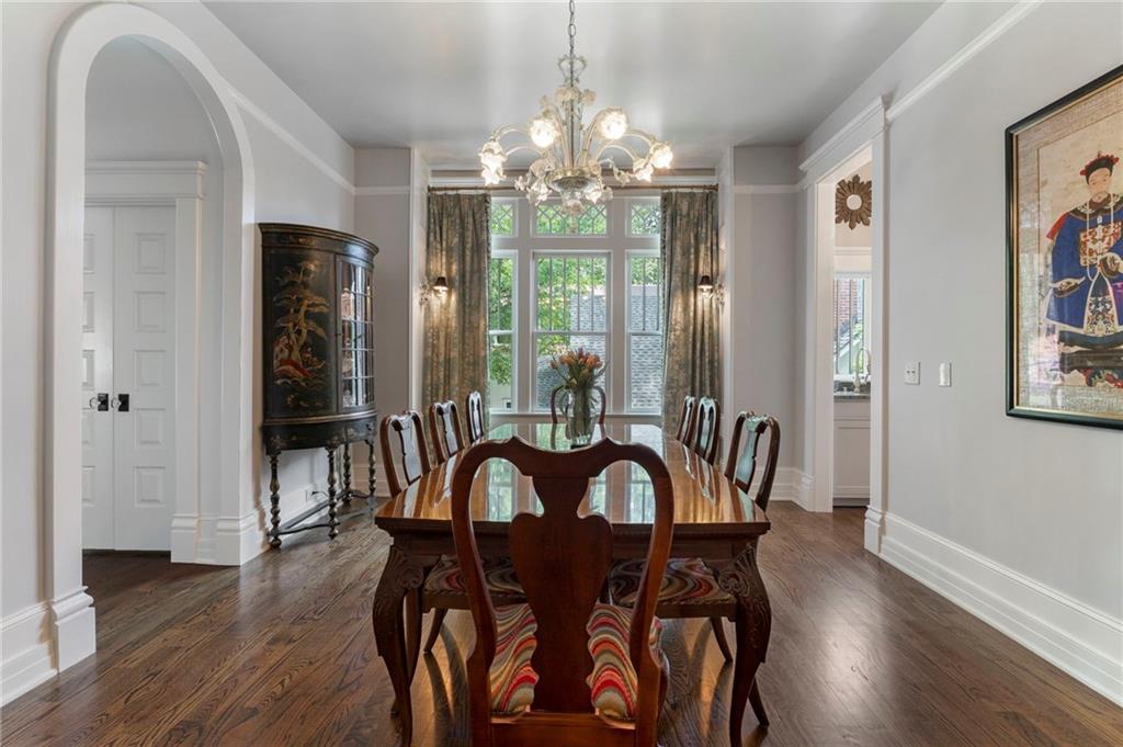 2519 Forrest Way Northeast Atlanta, GA 30305 - Photo 11 of 36 a view of a dining room with furniture window and wooden floor
