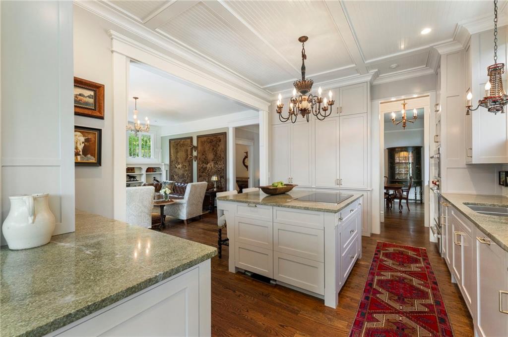 2519 Forrest Way Northeast Atlanta, GA 30305 - Photo 17 of 36 a very nice looking room with kitchen island a chandelier