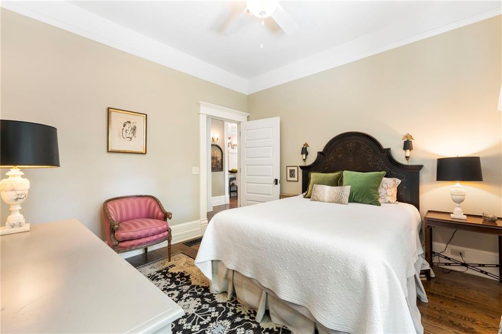 2519 Forrest Way Northeast Atlanta, GA 30305 - Photo 25 of 36 a bedroom with a bed and wooden floor