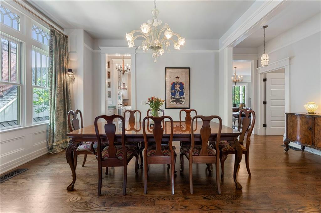 2519 Forrest Way Northeast Atlanta, GA 30305 - Photo 10 of 36 a view of a dining room with furniture window and wooden floor