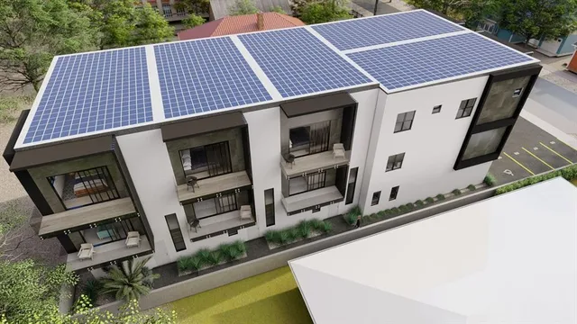 a aerial view of a house with a swimming pool