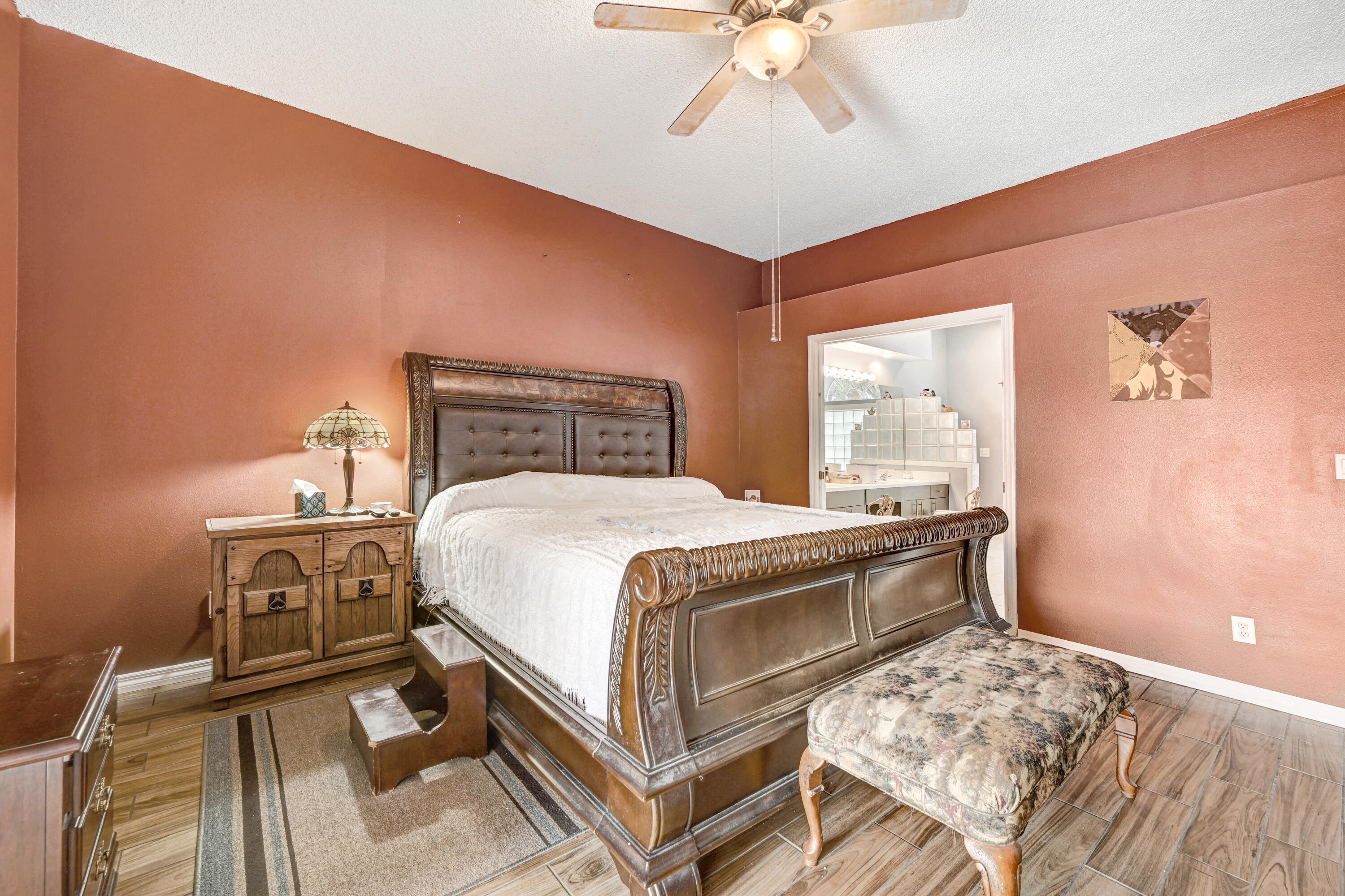 4600 James Road Cocoa, FL 32926 - Photo 11 of 56 a bed sitting in a bedroom next to a window