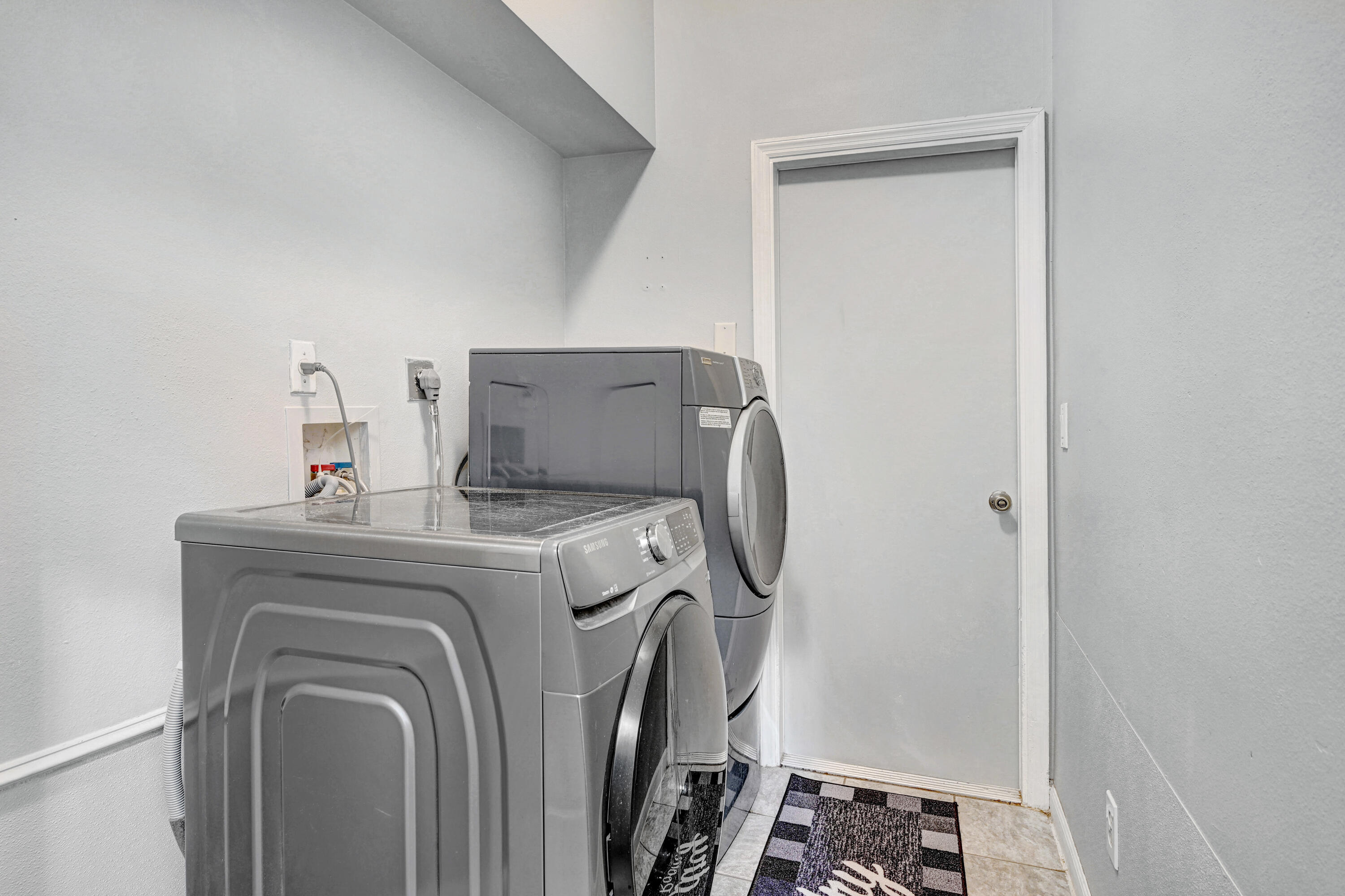 4600 James Road Cocoa, FL 32926 - Photo 16 of 56 a utility room with dryer and washer