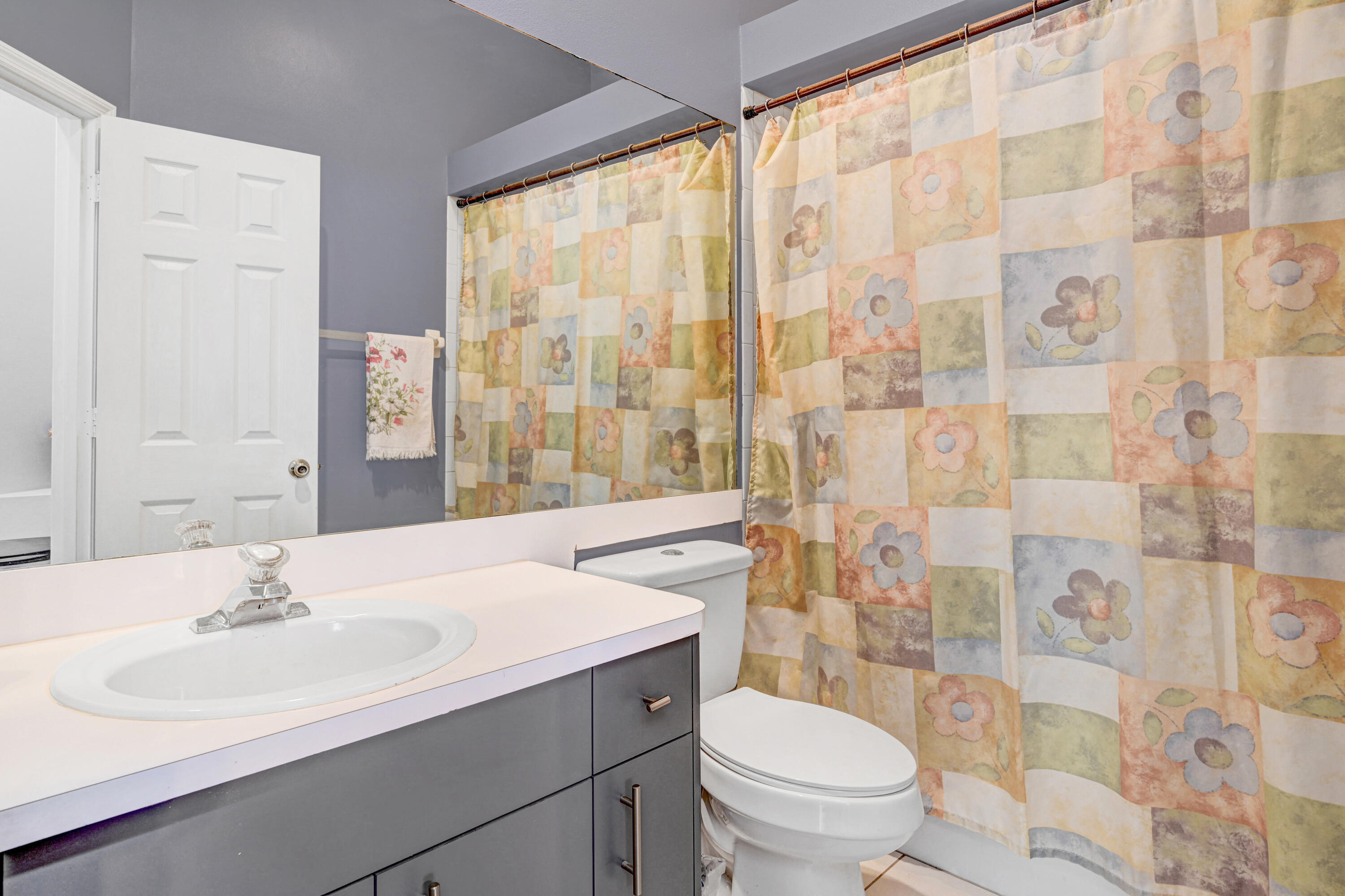 4600 James Road Cocoa, FL 32926 - Photo 18 of 56 a bathroom with a sink toilet and shower