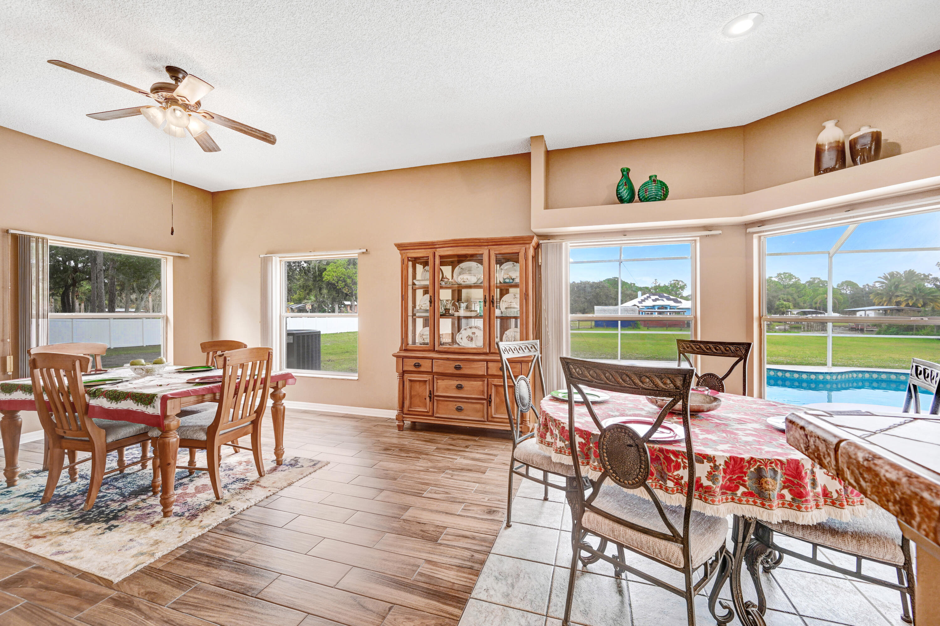 4600 James Road Cocoa, FL 32926 - Photo 26 of 56 a dining room with furniture mountain view and wooden floor
